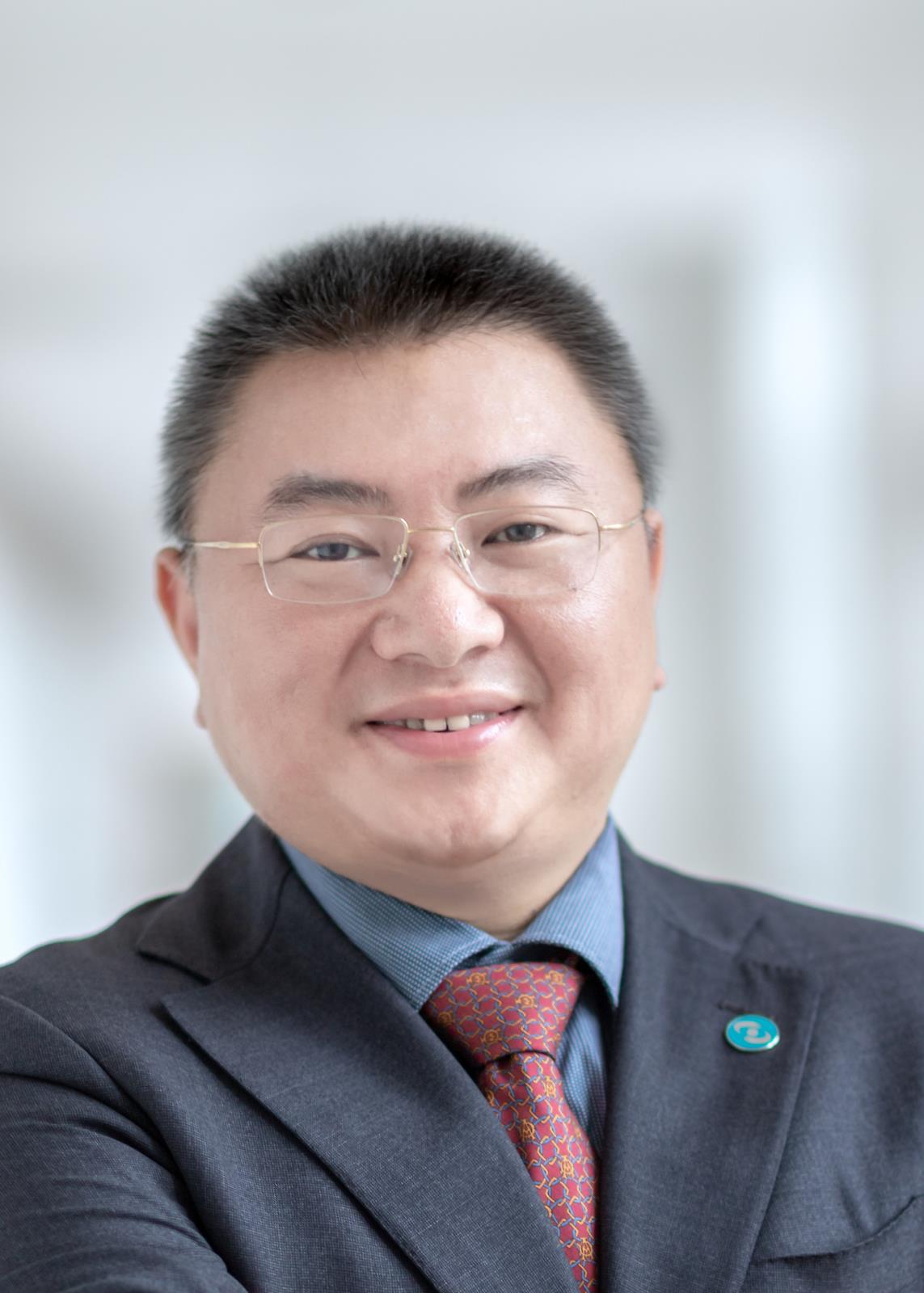 周老师近照.jpg 周老师近照.jpg